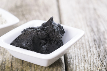 black mud on old wood texture