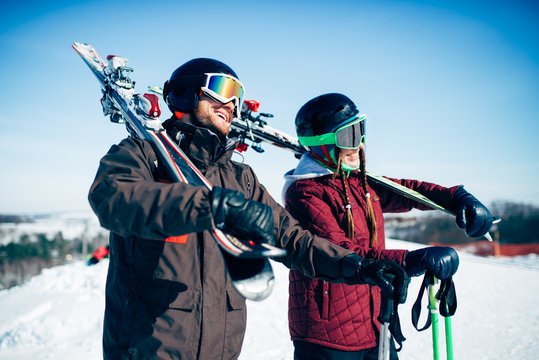 Skiers with skis and poles, extreme lifestyle
