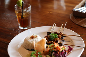Tasty indonesian satay with rice gastronomic
