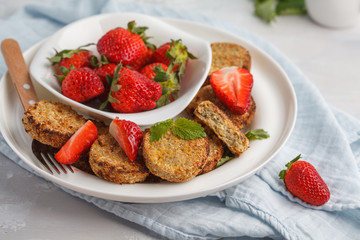 Vegan breakfast sweet tofu fritters (pancakes) with strawberries. Healthy vegan food concept.