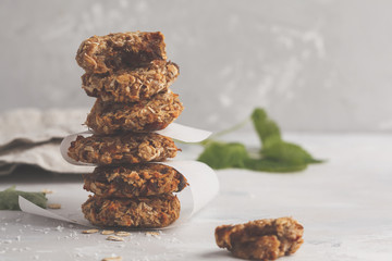Vegan oatmeal cookies with dates and a banana. Healthy vegan detox dessert on a light background, copy space