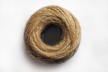 the texture of the twine strands in a tangle on a white background