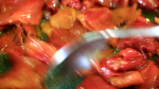 Cooking fresh red pepper closeup