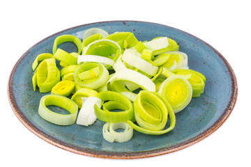 Plate with rings of chopped fresh leek