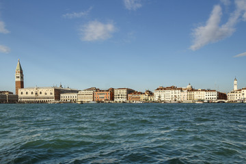 Fototapeta na wymiar Seaside view on St Mark's Campanile (Bell Tower) in Venice, Italy, 2016
