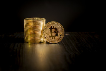  Bitcoin coins on black background