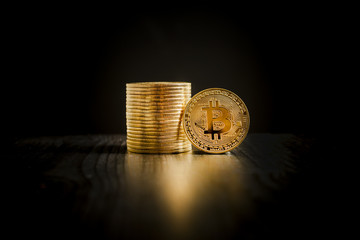  Bitcoin coins on black background