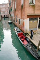 Fototapeta na wymiar Venice, Italy, Gondolier waiting for the clients