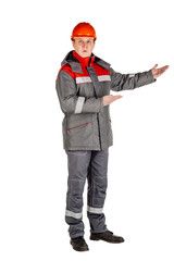 Male builder over white wall background. repair, construction, building, people and maintenance concept.