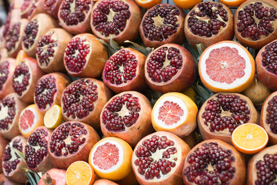Fresh fruits (pomegranates, oranges and grapefruits) ready for making juice at Istanbul street market