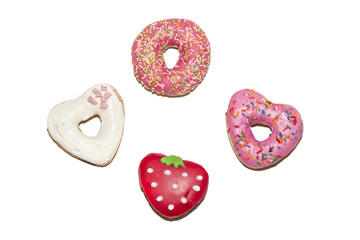 Strawberry glazed donuts isolated on a white background. Top view.