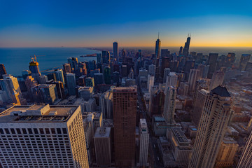 Chicago Skyline aerial view skyscrapers by the beach, sunset.
