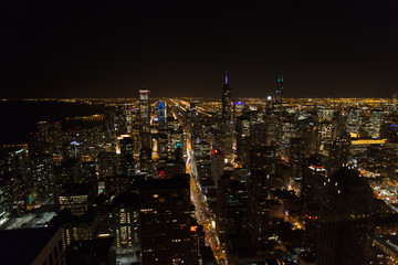 Fototapeta premium Chicago Skyline aerial view skyscrapers by the beach, night shot