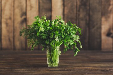 vegetables - a set of ingredients for salad (tomato, cucumber, radish, pepper, arugula, basil, parsley, dill, herbs, herbs, radish and others)
