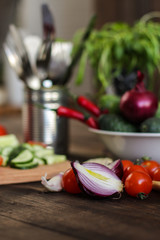 vegetables - a set of ingredients for salad (tomato, cucumber, radish, pepper, arugula, basil, parsley, dill, herbs, herbs, radish and others)