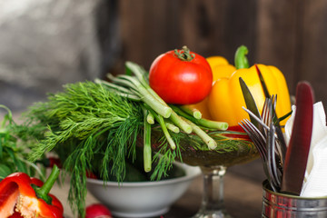vegetables - a set of ingredients for salad (tomato, cucumber, radish, pepper, arugula, basil, parsley, dill, herbs, herbs, radish and others)