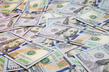 Fototapeta na wymiar Background of 100 dollar bills