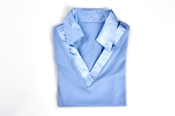 New female shirt with satin collar. Girls beautiful folded formal blouse for school wear, isolated...