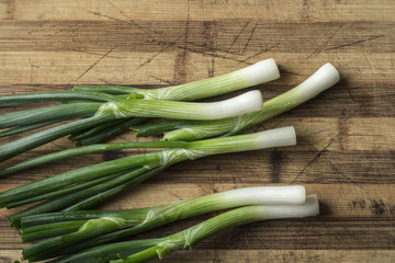 Young onion on cutting board