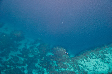 Fototapeta na wymiar blue ocean coral reefs zanzibar coast aerial