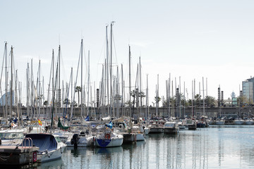 Fototapeta na wymiar Yachts are in harbor, Bacelona bay, Spain, editorial use 