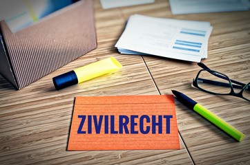 Index cards with legal issues with glasses, pen and bamboo with the german word zivilrecht in...