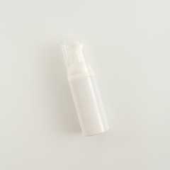 White cosmetic pump on white background. Natural beauty blank label for branding mockup concept.
