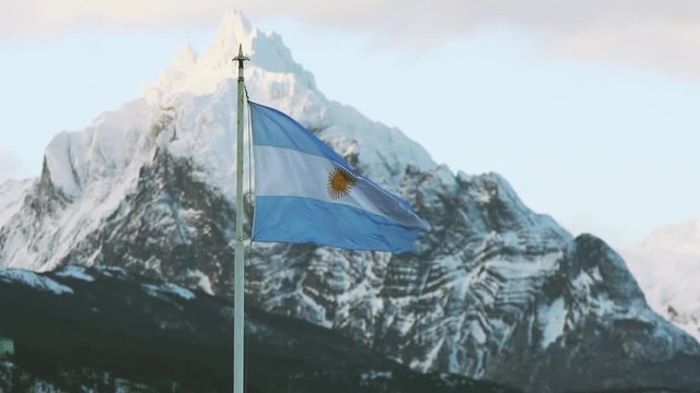 Argentina Flag in Ushuaia. Slow Motion. Zoom Out. 
