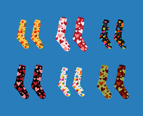 set of vector socks of different color textures and patterns on blue