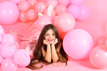 Little girl with balloons