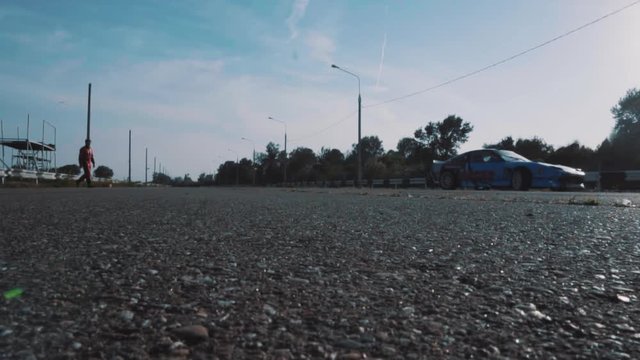 the racer goes to the car