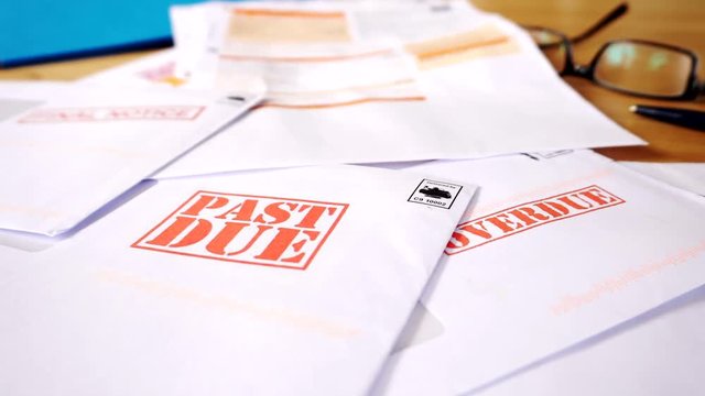 Debt Letters Piling Up With Bills Overdue, Past Due And Final Notice Red Writing