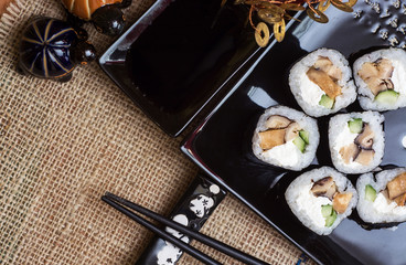 Sushi rolls  on black  table 