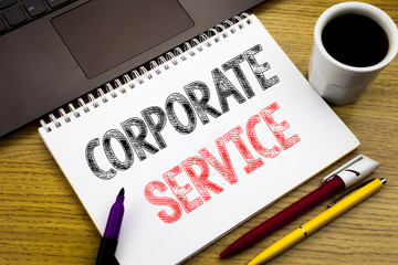 Writing text showing Corporate Service. Business concept for Csr Digital Content written on notebook book on the wooden background in the Office with laptop