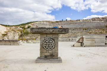 INKERMAN, CRIMEA - SEPTEMBER 2014: Imitation of the ancient sacrificial altar in the old career of...