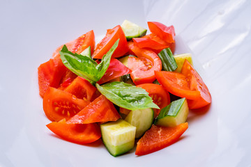 Vegetable salad with tomatoes and cucumbers
