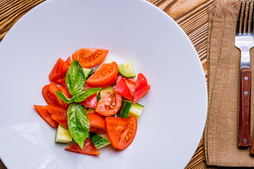 Vegetable salad with tomatoes and cucumbers