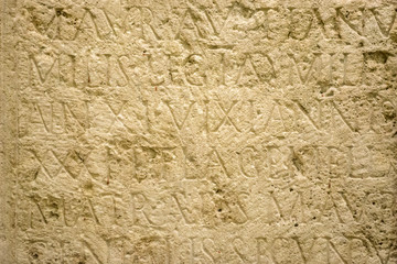 Fragment of ancient door-stone with engraved letters