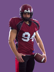 Fototapeta premium American Football Player isolated on colorfull background