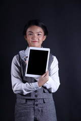 Business Kid Girl in formal suit stand on dark abstract background