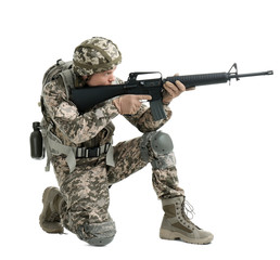 Male soldier with machine gun on white background. Military service