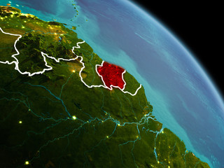 Suriname in morning from orbit