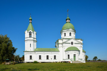Fototapeta na wymiar Greek Orthodox Church, religious, building XVIII century. Three Saints Church in ..Lemeshi, Chernihivska oblast, Ukraine.