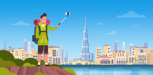 Man Tourist With Backpack Taking Selfie Photo Over Beautiful Dubai City Background Flat Vector Illustration