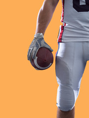 closeup American Football Player isolated on colorfull background