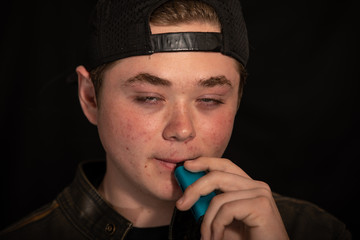 teenager is high from vaping cannabis oil