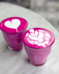 Beetroot super latte on marble background