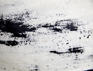 Abstract glass texture. Cracks on a piece of green and ultraviolet glass and on the wooden texture