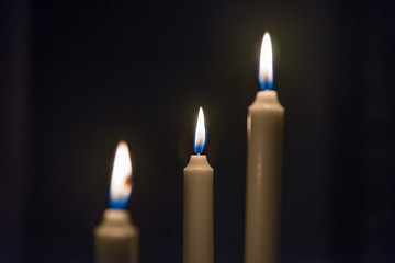 Three candles light