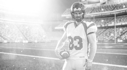 American Football Player isolated on big modern stadium field